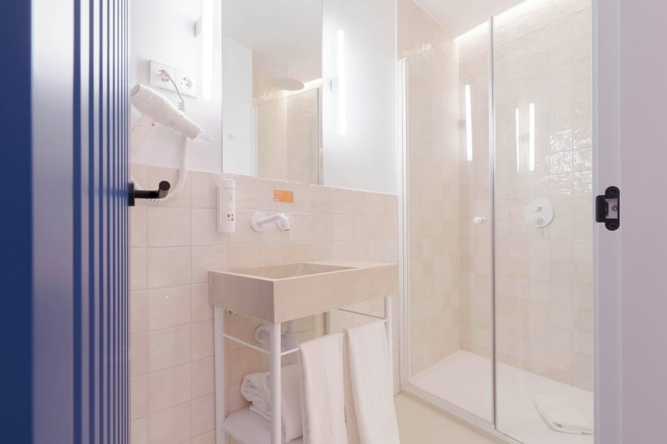 Standard Double Room | Bathroom | Shower, hair dryer, towels, soap
