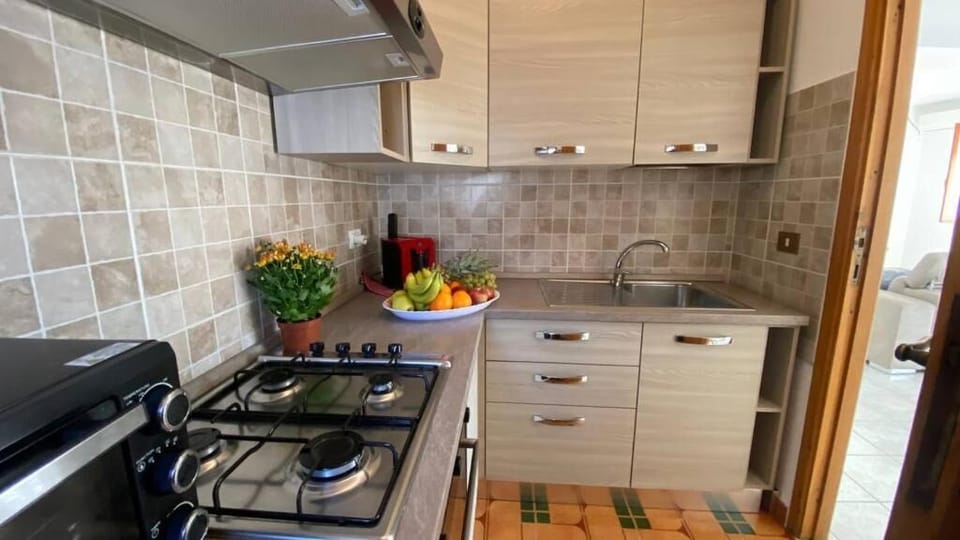 Apartment | Private kitchen | Full-size fridge, stovetop, cookware/dishes/utensils