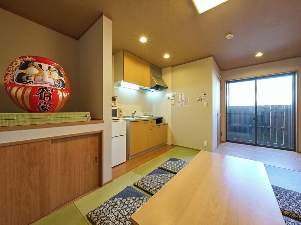 Basic Apartment | Living area | 32-inch flat-screen TV with digital channels