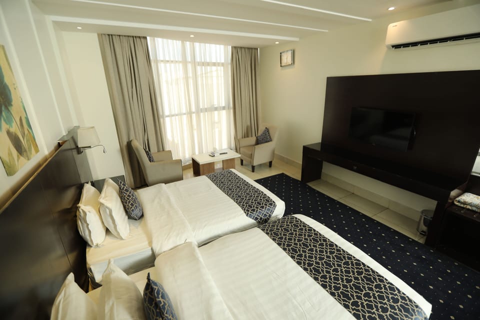 Basic Twin Room, 2 Queen Beds | In-room safe, blackout drapes, soundproofing, iron/ironing board