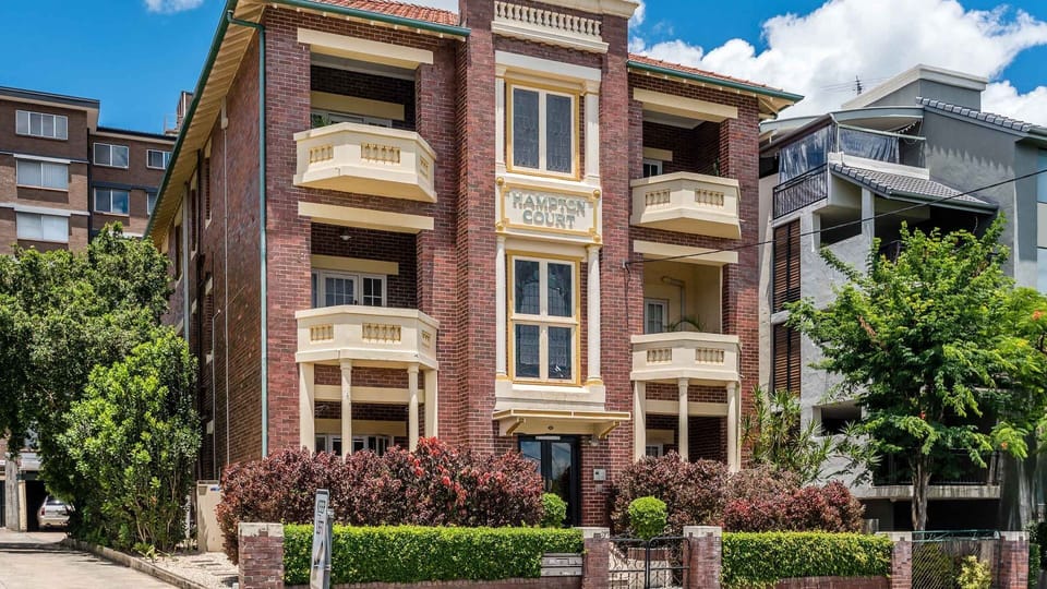 Charming heritage façade with beautifully maintained gardens