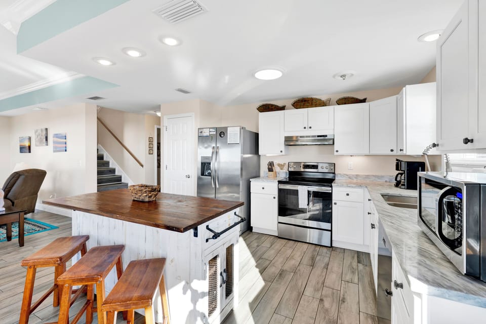 The kitchen island offers bar seating