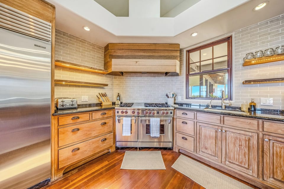 Newly Renovated Chef's Kitchen with SubZero Fridge, Wolf Range and stocked Pantry
