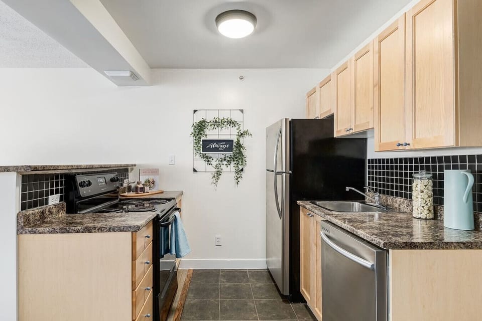 Kitchen has all amenities needed to prepare a delicious meal.