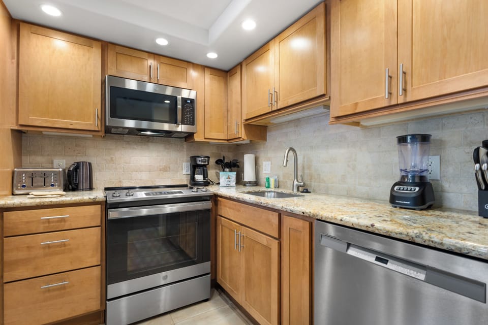 Your fully equipped kitchen features granite counters, stainless appliances, and everything you need to create memorable meals during your stay.