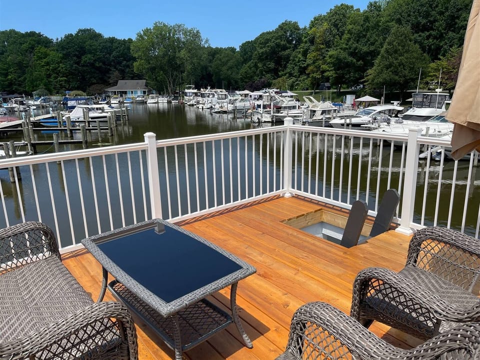 Panoramic marina views an ideal spot for morning coffee or sunset lounging above the water.