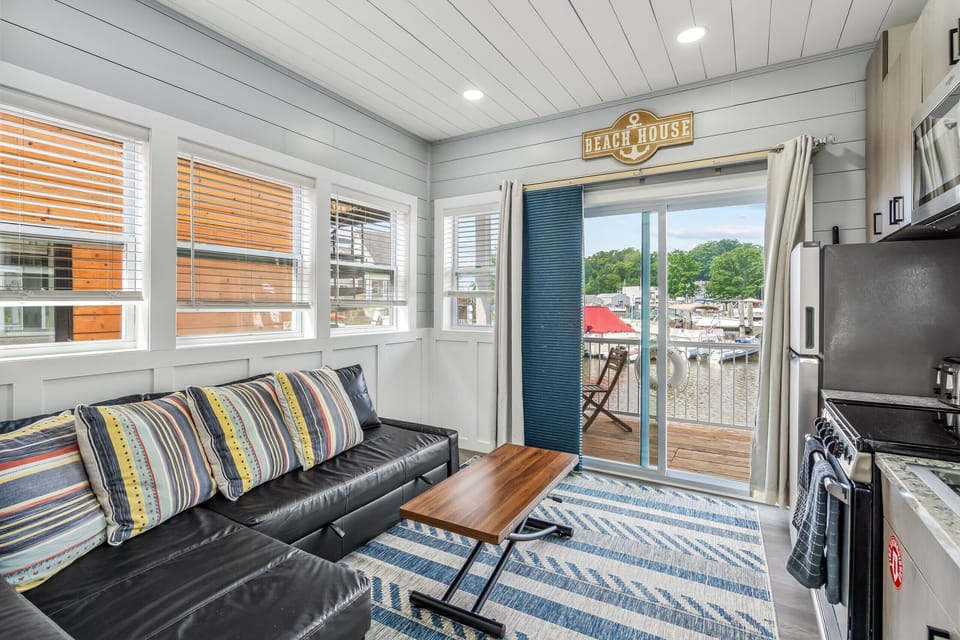 Comfy  pull-out sofa bed, marina views, and a sliding doors that open to the waterfront deck.