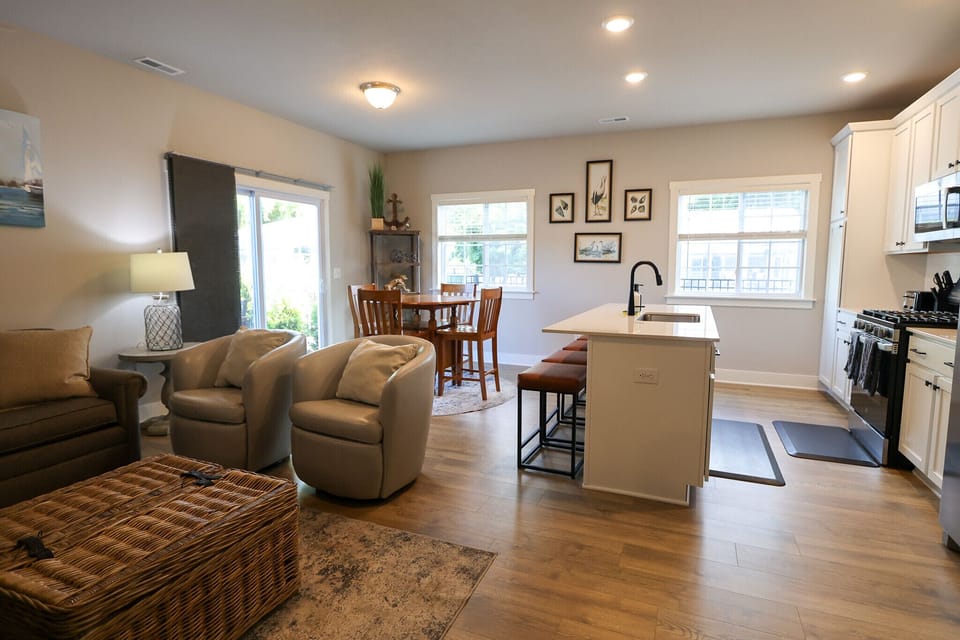 Cozy open-concept living area at Blissful Daze offers the perfect space for families and friends to unwind.