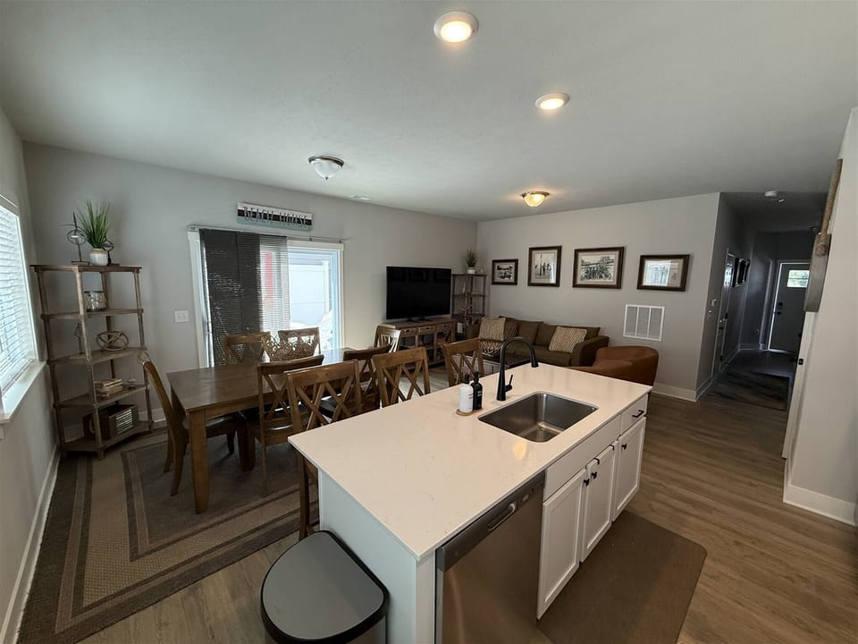 Open-concept kitchen, dining, and living area –perfect for cooking, relaxing, and spending time together.