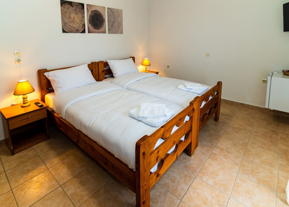 Family Quadruple Room, Balcony, Mountain View | Minibar, free WiFi, bed sheets