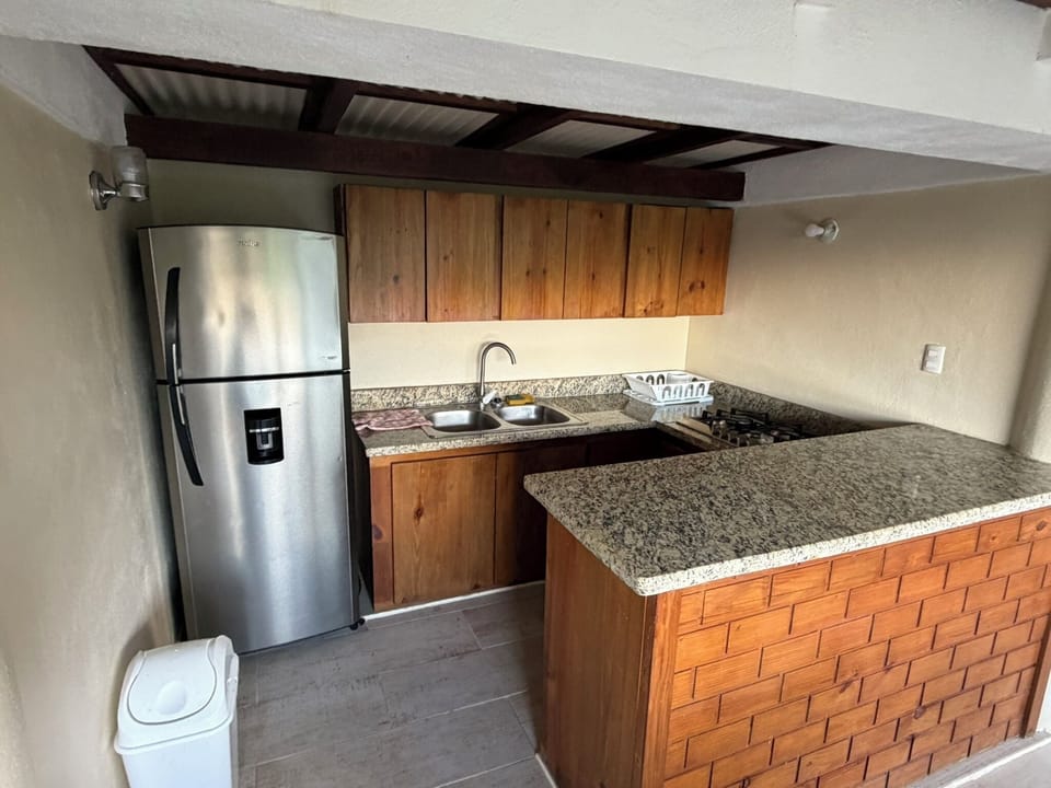 Family Quadruple Room, Mountain View | Private kitchen | Full-size fridge, stovetop, cookware/dishes/utensils