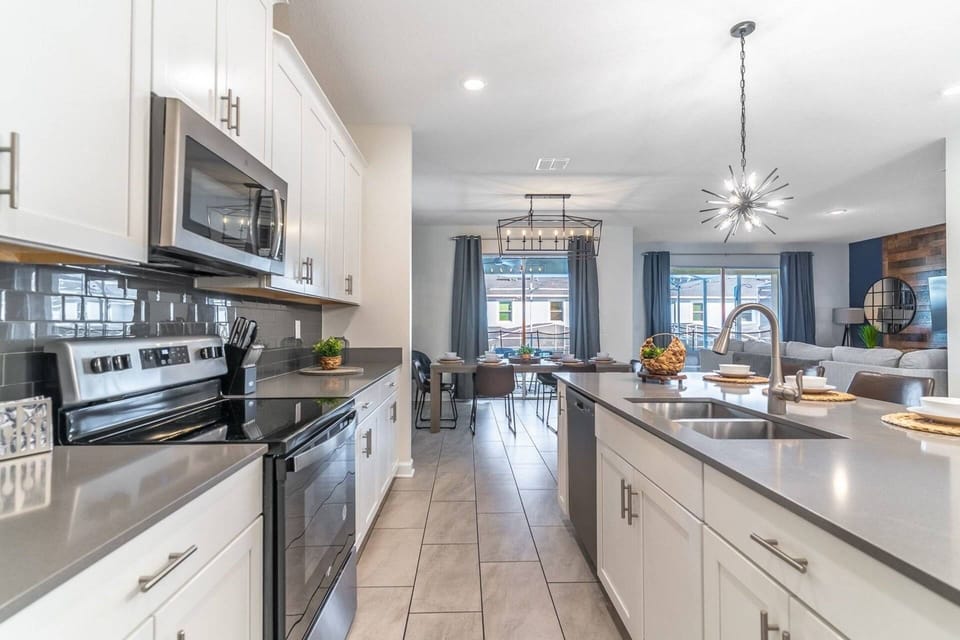 Upgraded kitchen with electric oven and stove, microwave and all items you need!