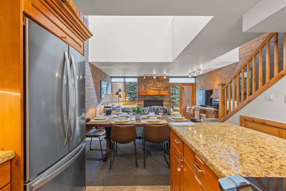 Cook, dine, and relax together in this open layout