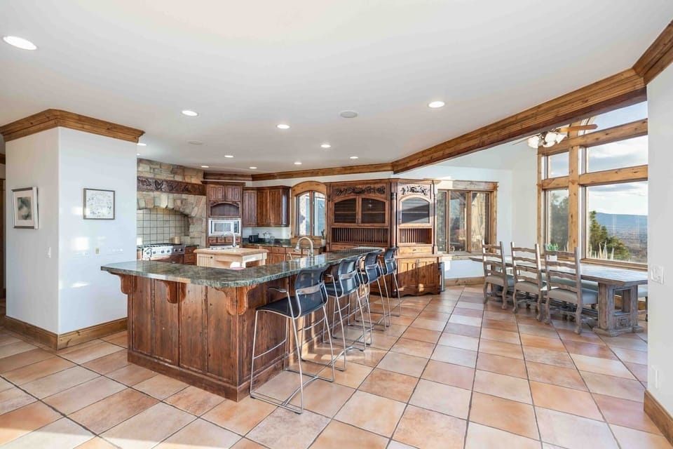 Dining area and counter perfect for family gatherings.