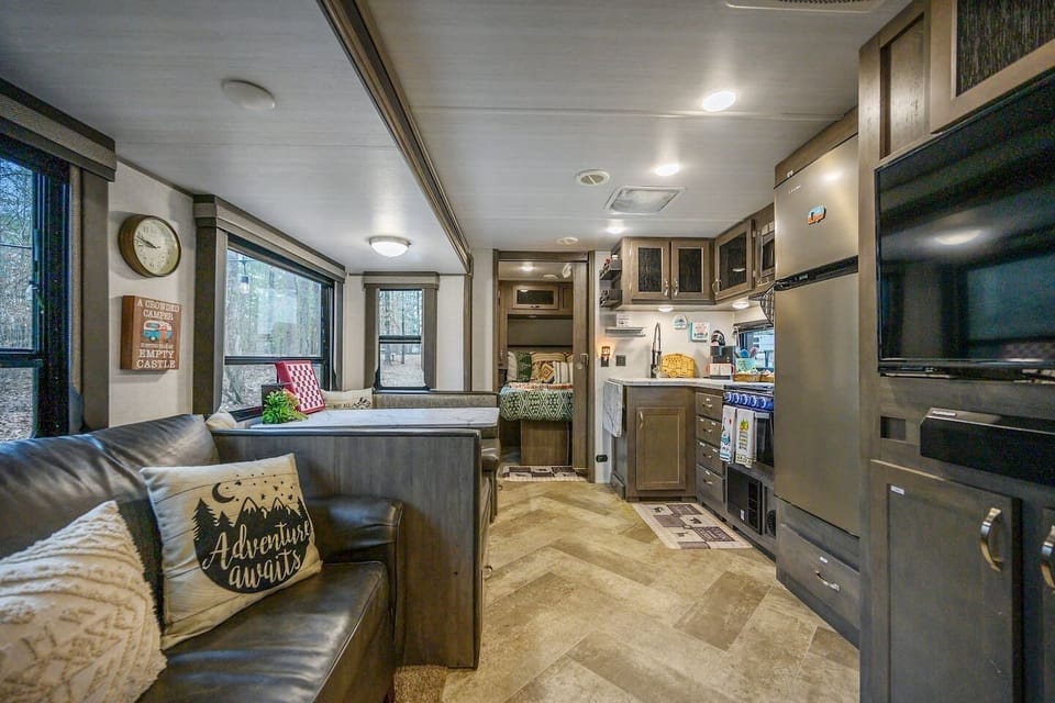 Couch, dining and kitchen