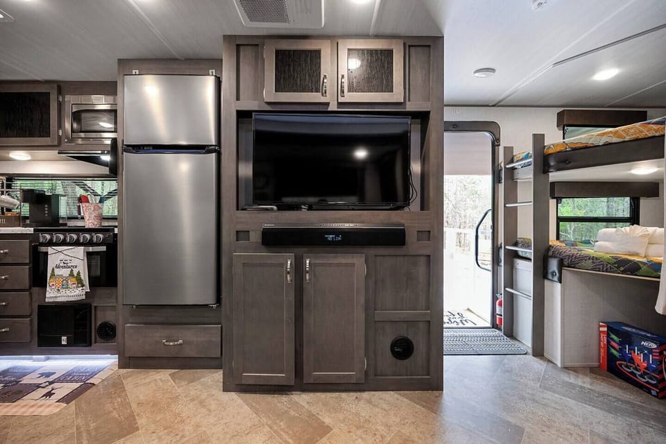 TV and DVD player with games below