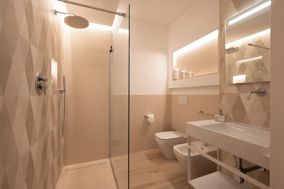 Deluxe Double or Twin Room, Balcony, Garden View | Bathroom | Shower, hair dryer, towels, soap