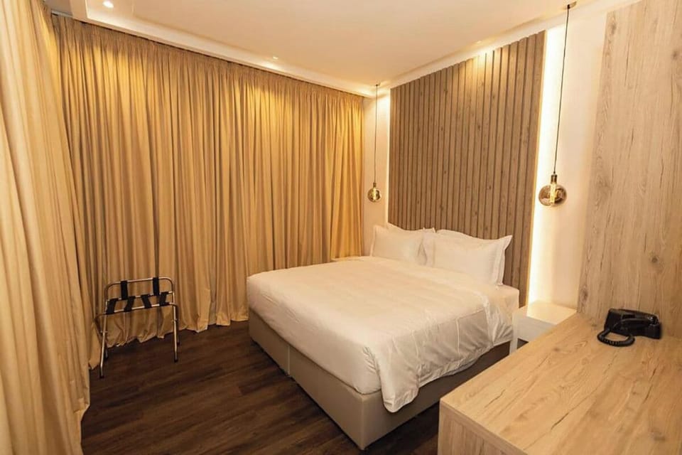 Junior Suite, Pool View | In-room safe, free WiFi