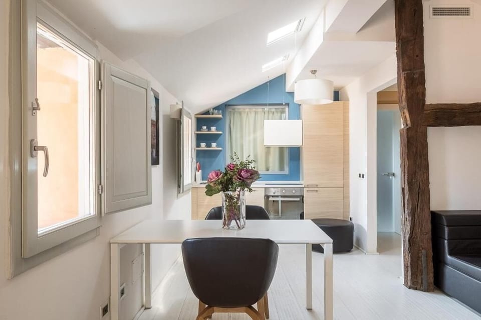 Apartment, City View | Living area | Flat-screen TV, heated floors