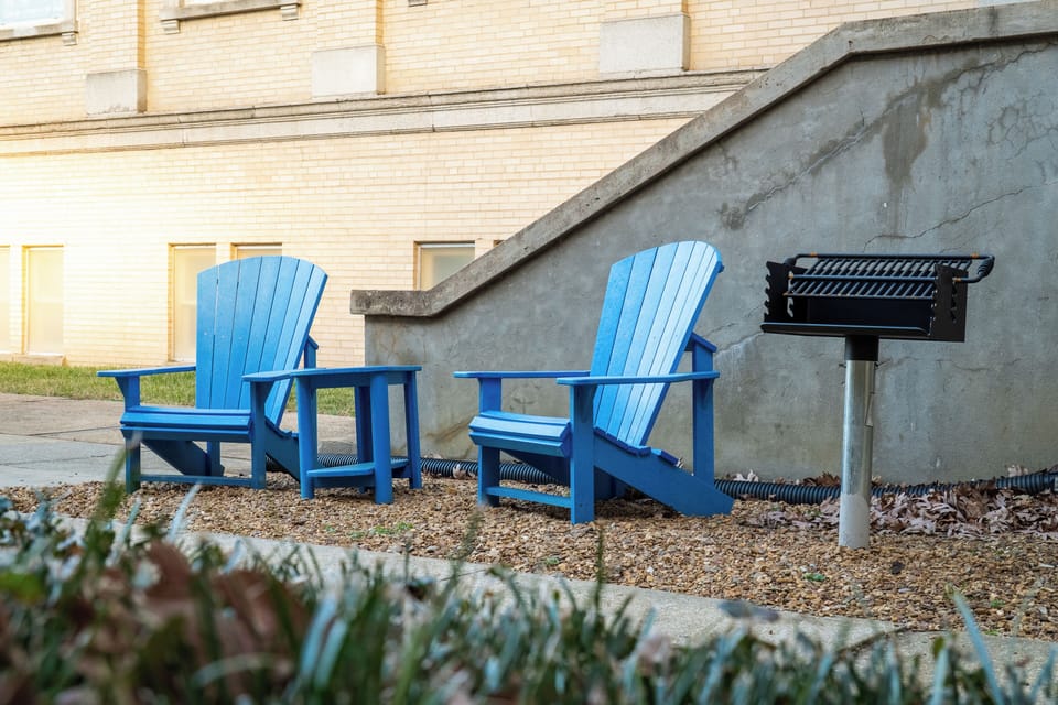 Outdoor seating area with 2 charcoal grills