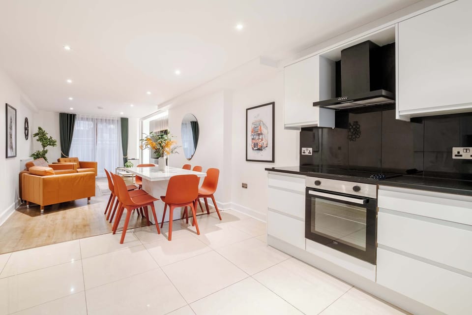 Full Kitchen | Savor the luxury of a fully-equipped kitchen, designed for any duration of stay. Revel in modern conveniences such as a washer, dryer, dishwasher, Nespresso machine, and a fresh water dispenser, ensuring your comfort and convenience.