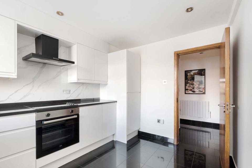 Full Kitchen | Fully equipped kitchen with everything you need for a short or long stay, including a fresh water dispenser, coffee machine, washing machine and dryer, and a dishwasher.