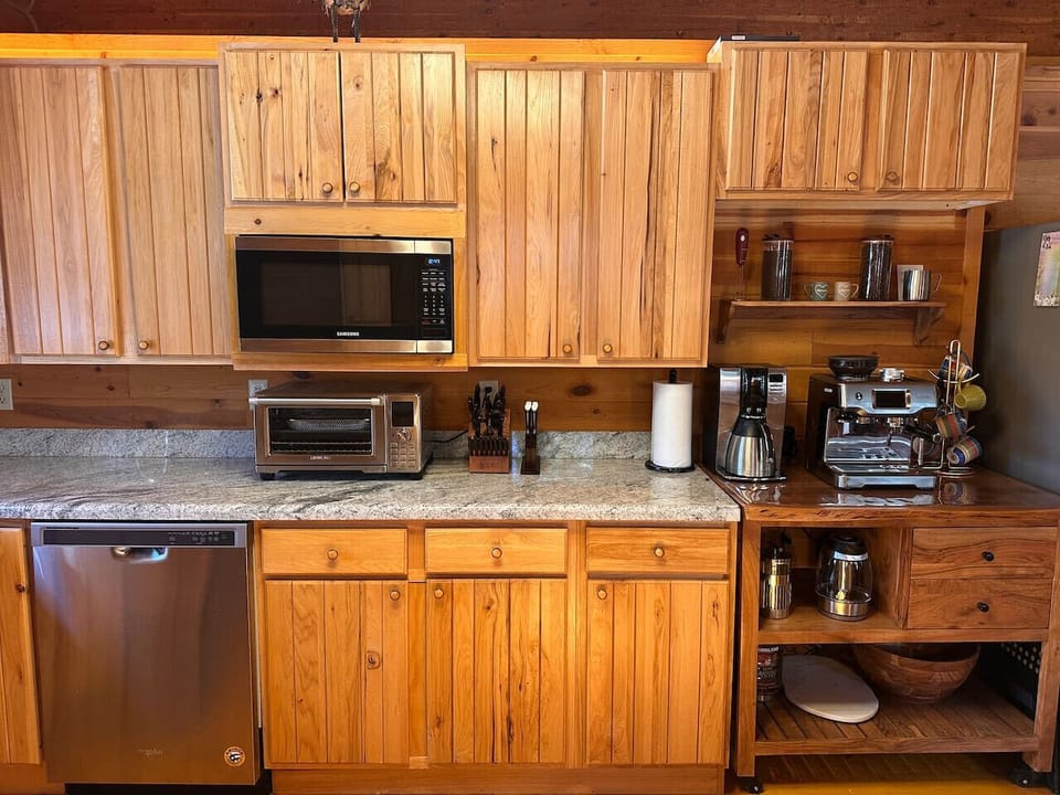 Designed for every kind of morning—our full coffee and tea bar includes a Breville espresso machine, drip coffee maker, and a kettle with built-in infuser for loose-leaf tea.