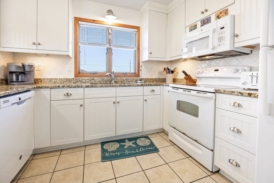 This well-equipped kitchen includes everything needed for home-cooked meals.