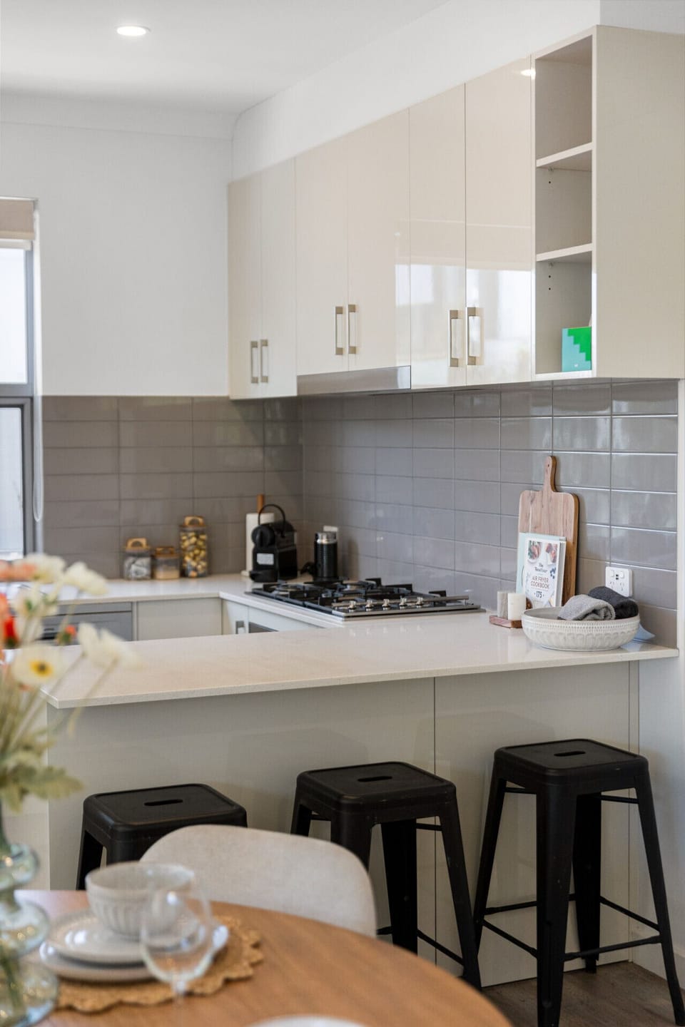 Start the day with coffee at hand, moving effortlessly between the kitchen, dining area, and outdoor space.