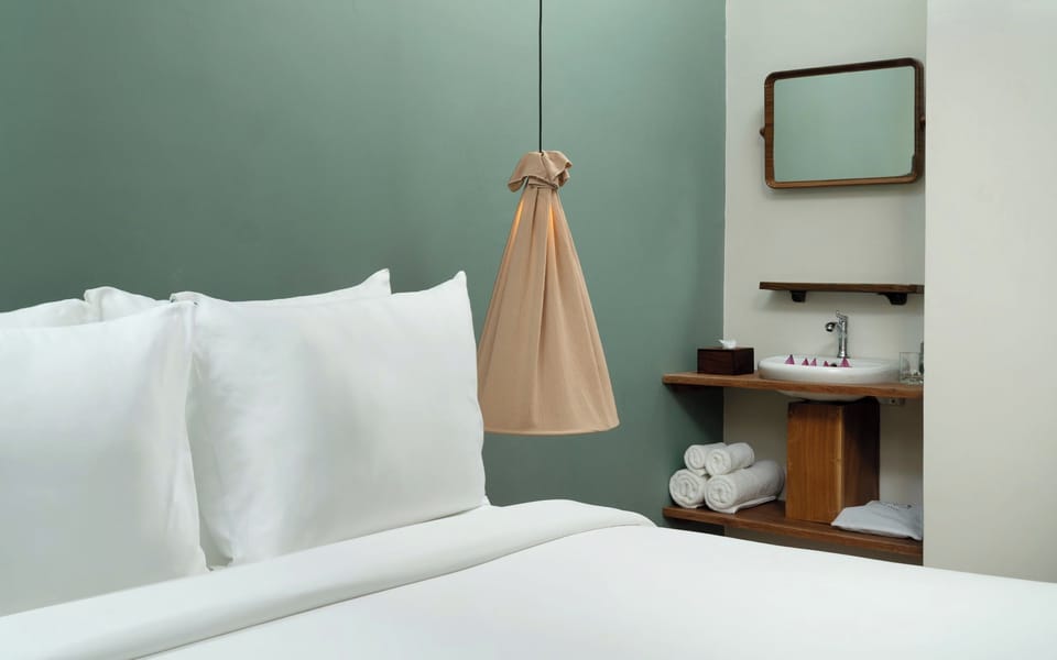 Suite, Pool View | In-room safe, desk, laptop workspace, iron/ironing board