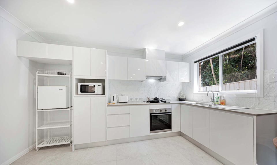 Modern kitchen with quality appliances and ample counter space for easy meal preparation.