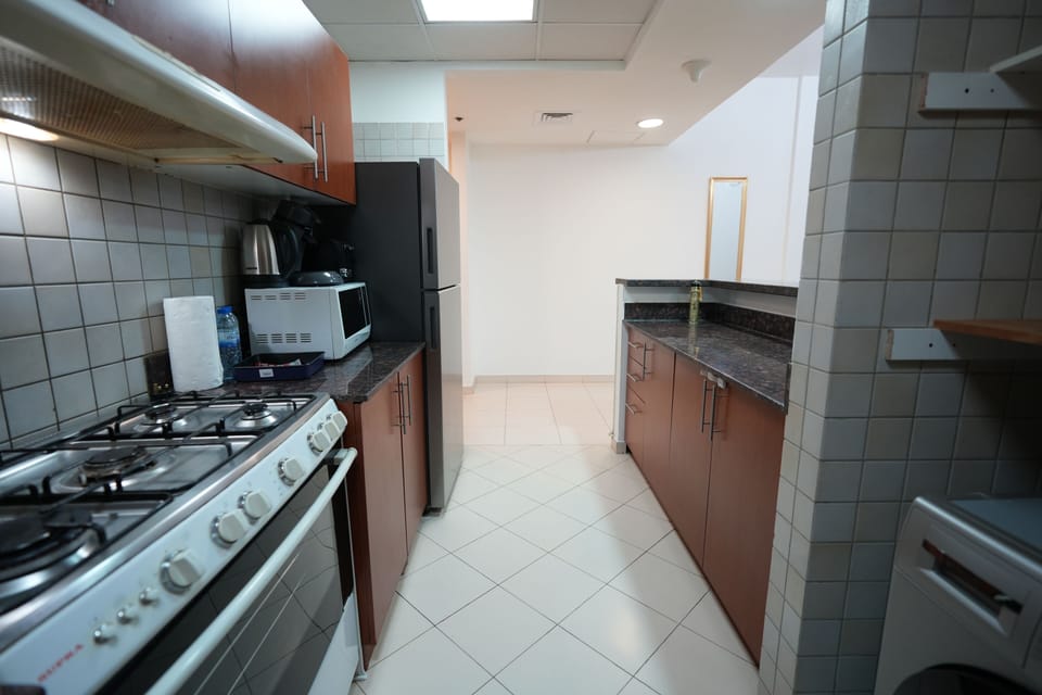 Comfort Apartment | Private kitchen | Dining tables