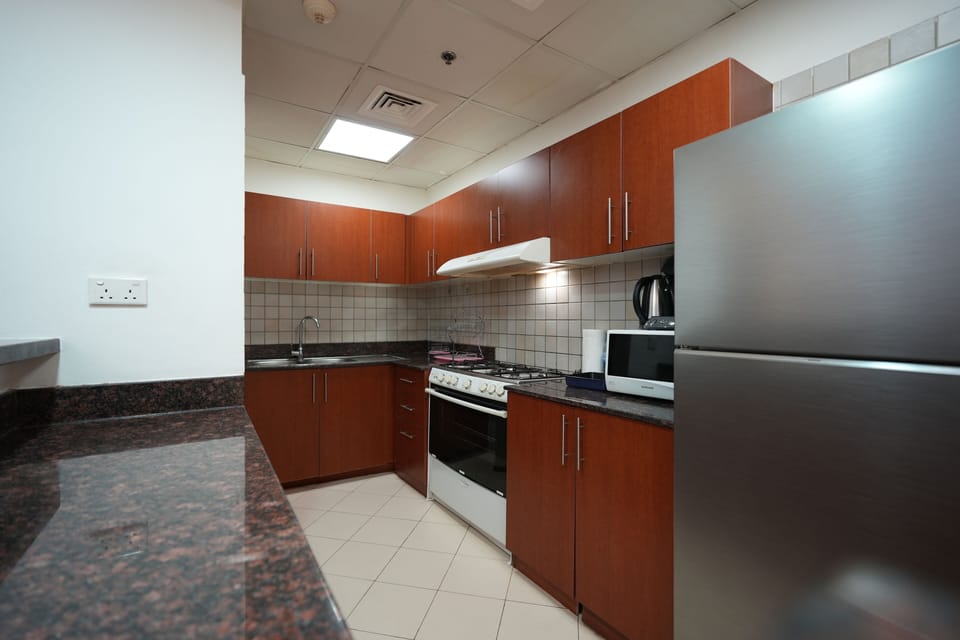 Comfort Apartment | Private kitchen | Dining tables