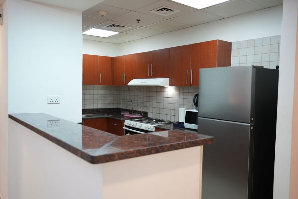 Comfort Apartment | Private kitchen | Dining tables