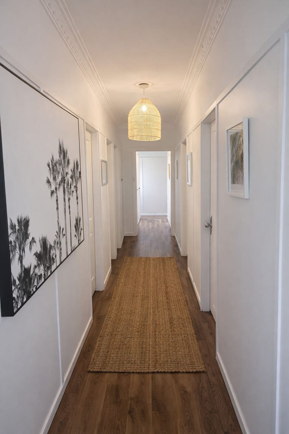 Hallway to bedrooms and seperate toilet/shower/bathrub rooms