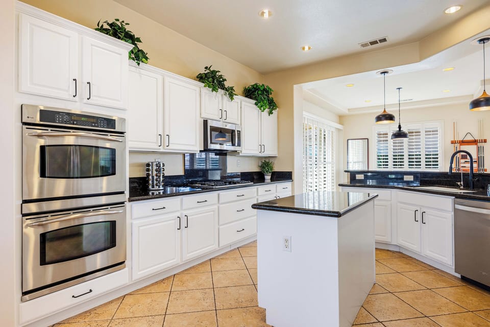 A beautifully designed kitchen that brings people together, offering generous space for cooking.