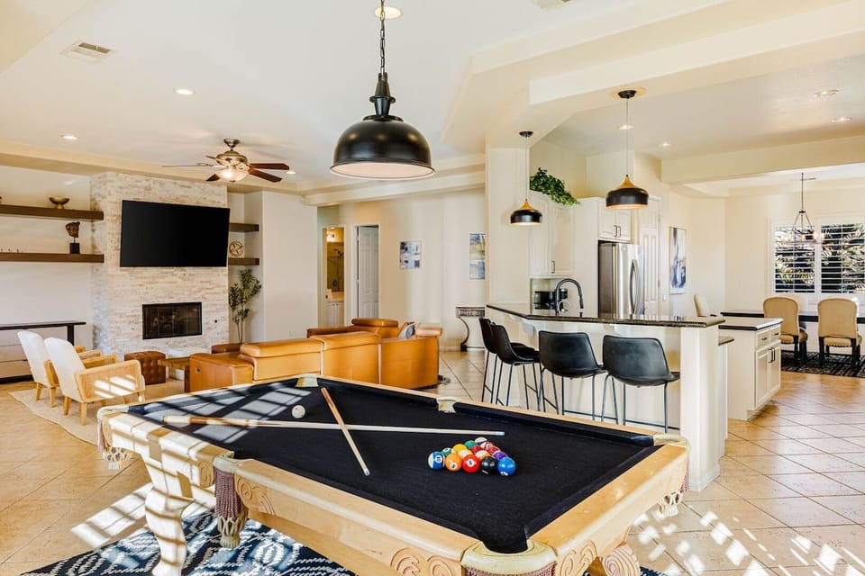 Game room flows into the kitchen—perfect for friendly competition