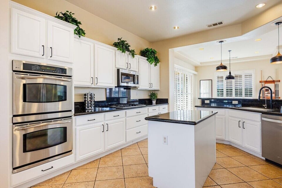 A beautifully designed kitchen that brings people together, offering generous space for cooking.