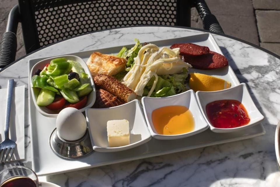 Superior Condo | Breakfast area | Daily continental breakfast for a fee