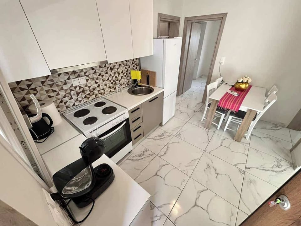 Functional Kitchen Space with Mosaic Backsplash