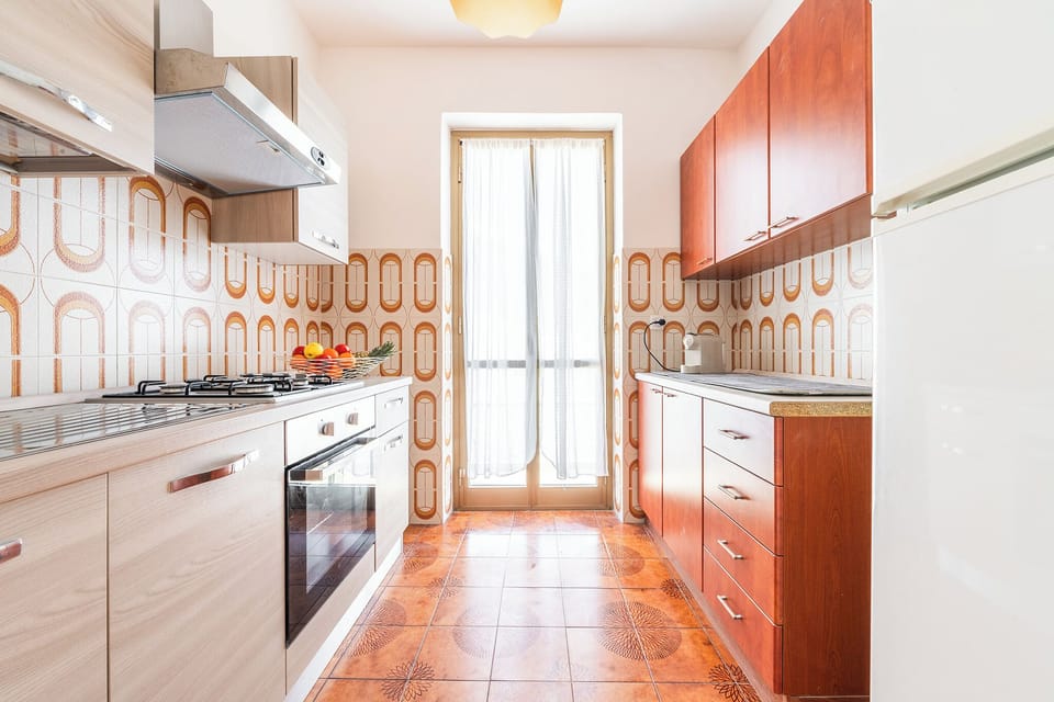 Apartment, 3 Bedrooms | Private kitchen | Full-size fridge, oven, stovetop, cookware/dishes/utensils