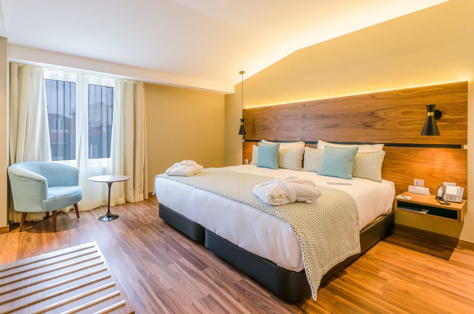 Premium bedding, down comforters, in-room safe, desk