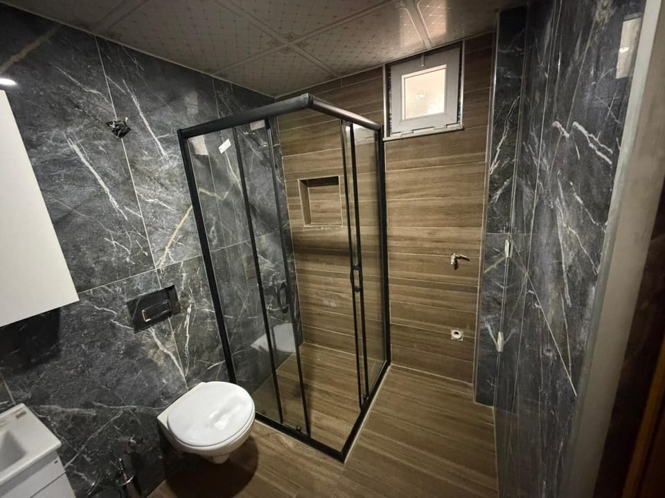Shower, free toiletries, towels, soap