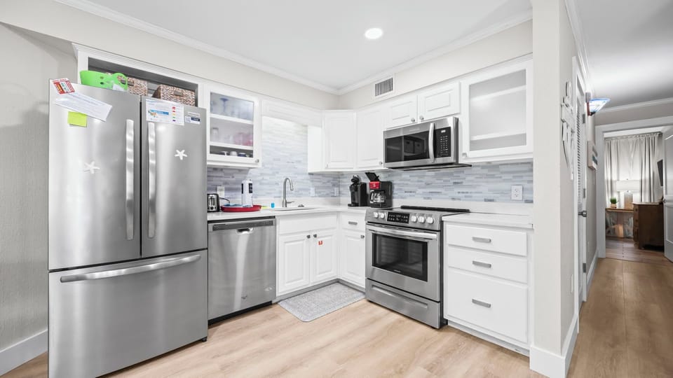 Sandpiper 2A - “Kitchen with all essential appliances and tools for easy meal preparation.