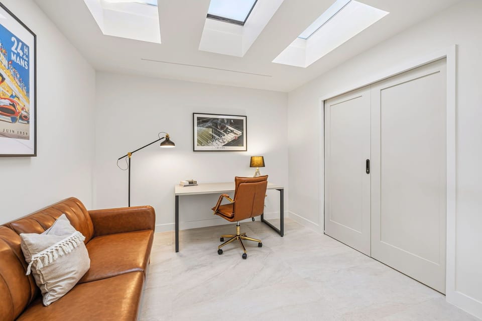 Office Area with Pull-out Twin Sleeper Sofa and Desk