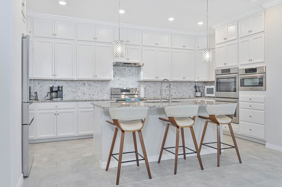 Tropical Escape - Fully equipped kitchen with island seating.
