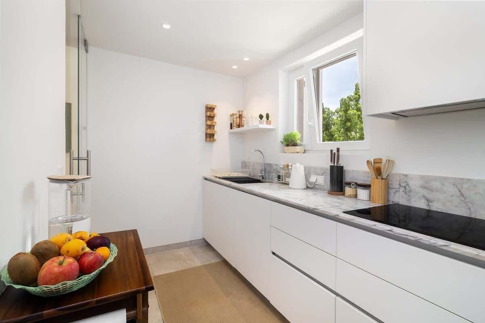 The kitchen has stainless steel SIEMENS appliances, a spacious countertop. It has everything that you need for cooking and entertaining.