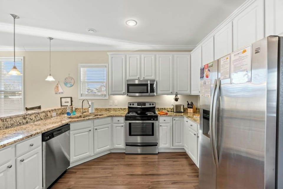 An updated kitchen makes preparing meals a breeze.