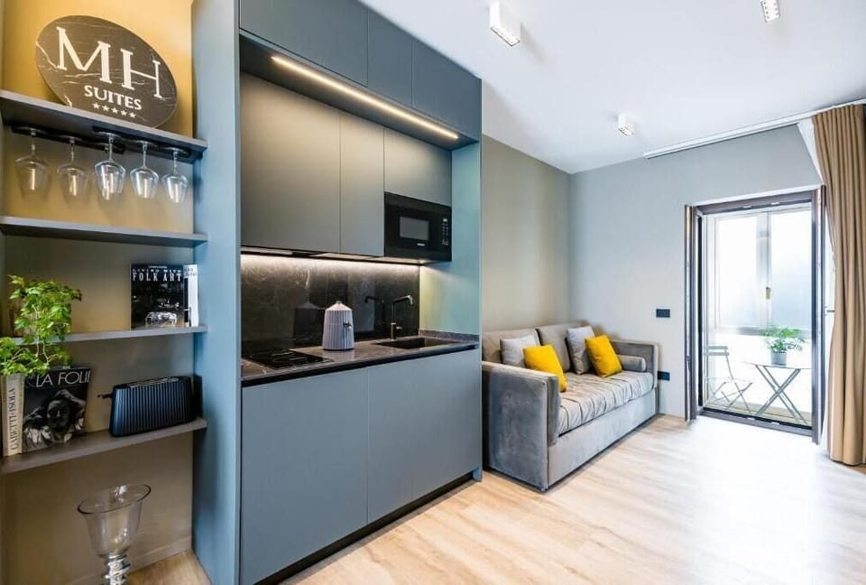 Junior Suite, 1 Queen Bed with Sofa bed, City View | Private kitchen | Mini-fridge, coffee/tea maker