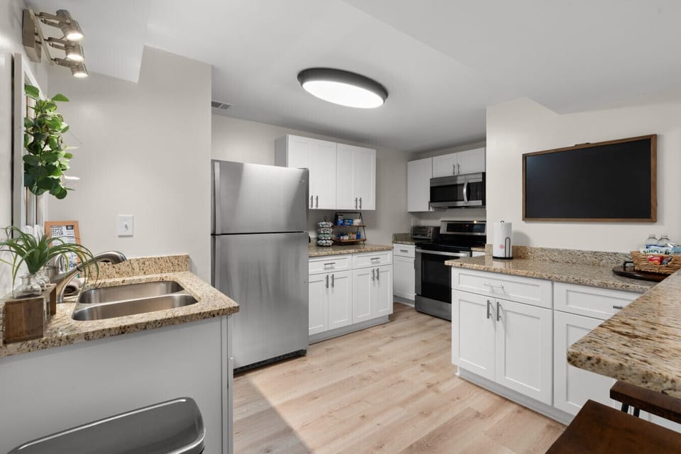 Fully equipped kitchen with full-size appliances, generous counter space, and everything needed for cooking meals during your stay.